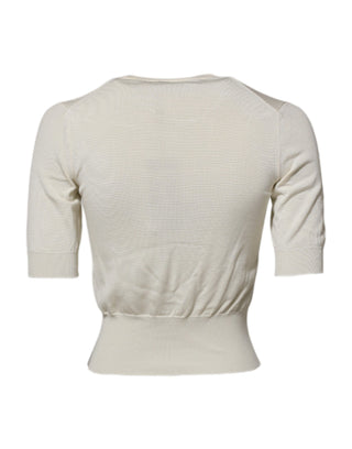 Blusa blanca de seda con mangas cortas tipo pulóver