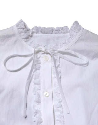 Weiße Bluse mit Rüschen und Spitze