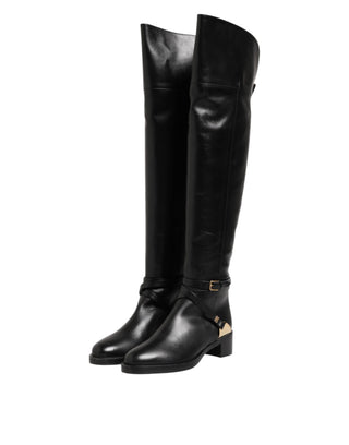 Schwarze hohe Stiefel aus Leder mit Schnallen