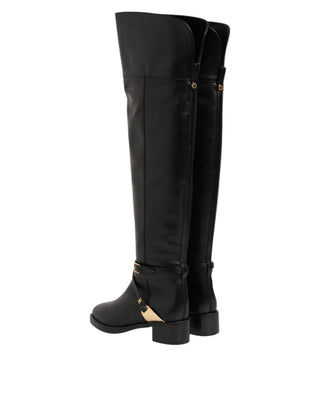 Schwarze hohe Stiefel aus Leder mit Schnallen