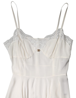 Vestido de seda blanco con encaje dorado y logo DG, estilo camisón