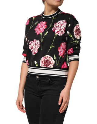 Top de algodón negro con estampado floral y mangas cortas