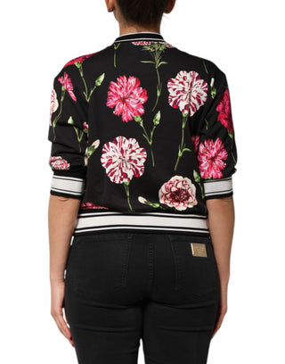 Top de algodón negro con estampado floral y mangas cortas