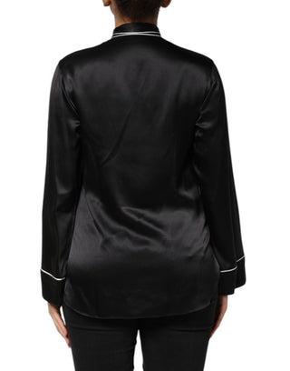 Blusa de seda negra con cuello ascot y botones