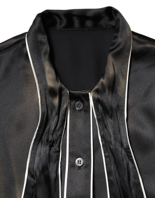 Blusa de seda negra con cuello ascot y botones