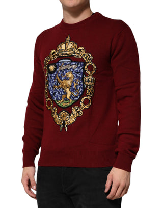 Suéter de cachemira burdeos con escudo de león