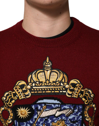 Suéter de cachemira burdeos con escudo de león