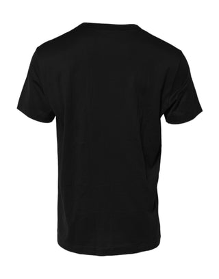 Camiseta negra de algodón con cuello redondo y logo en relieve  