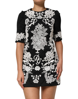 Schwarzes A-Linien-Kleid mit Spitzenborte und kurzen Ärmeln