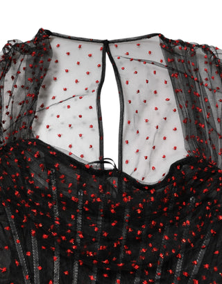 Schwarzes Minikleid mit langen Ärmeln, Etui-Schnitt und Spitzenbesatz