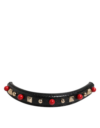 Bolso de cuero negro adornado con asa y correa de hombro para mujer