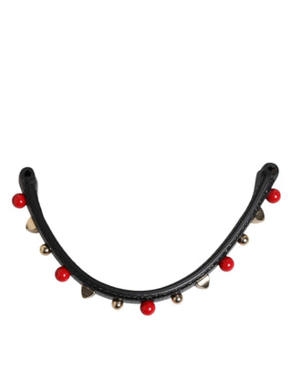 Bolso de cuero negro adornado con asa y correa de hombro para mujer