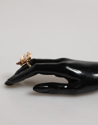 Anillo accesorio para mascota de resina beige con logo de latón dorado