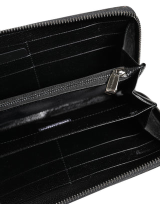 Cartera continental de cuero negro y gris con estampado de leopardo y cremallera alrededor