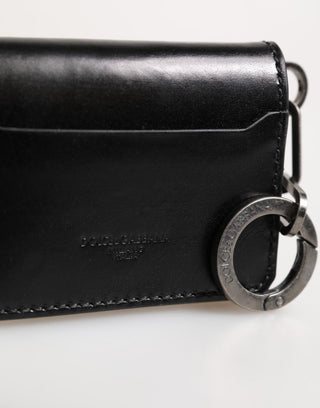 Cartera negra de piel con llavero y logo en relieve