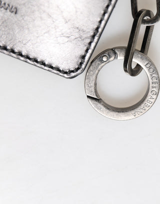 Cartera negra de piel con llavero y logo en relieve