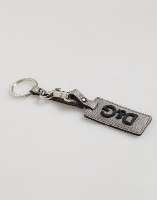 Schlüsselanhänger aus grauem Leder mit Logo und Metallring für Herren