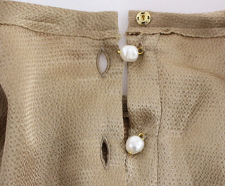 Blusa especial dorada con cristales para pasarela