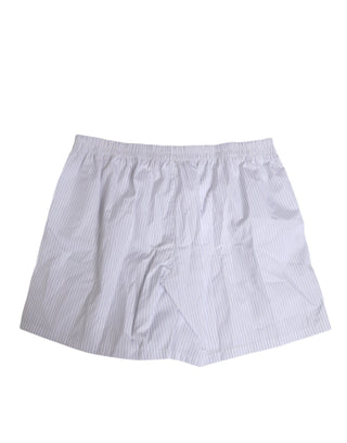 Bañador tipo short con botones y rayas de algodón blanco y azul  