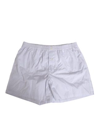 Bañador tipo short con botones y rayas de algodón blanco y azul  
