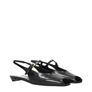 Sandalias planas de cuero negro