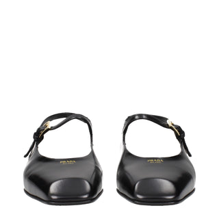 Sandalias planas de cuero negro