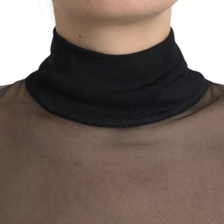 Blusa negra transparente de malla con cuello alto