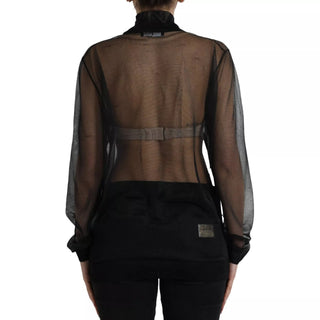 Blusa negra transparente de malla con cuello alto