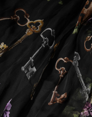 Trägerloses Kleid mit schwarzem Blumenschlüsselprint und Kristallen