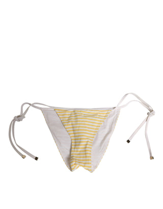 Ropa interior blanca con rayas amarillas y lazo lateral con logo