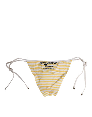 Ropa interior blanca con rayas amarillas y lazo lateral con logo