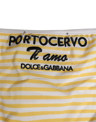 Ropa interior blanca con rayas amarillas y lazo lateral con logo