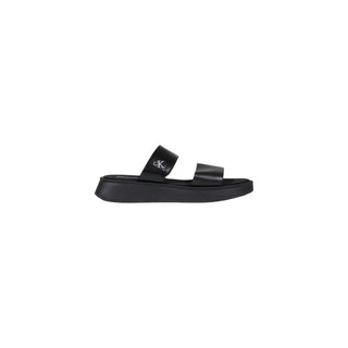 Sandalias planas de cuero negro