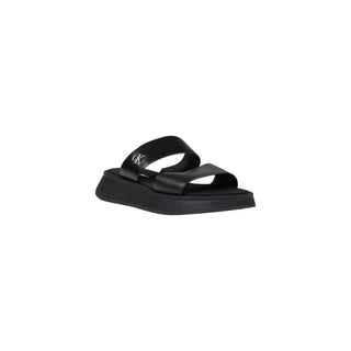 Sandalias planas de cuero negro