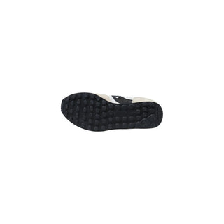 Zapatillas atléticas de cuero blanco y negro