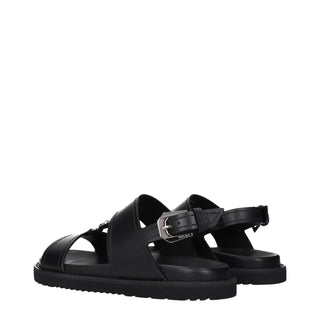 Schwarze flache Ledersandalen