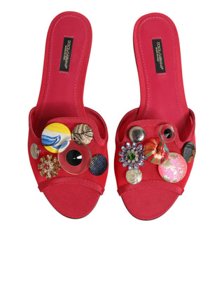Rote verzierte flache Slip-On-Sandalen