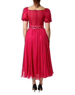 Vestido midi línea A de seda rosa adornado
