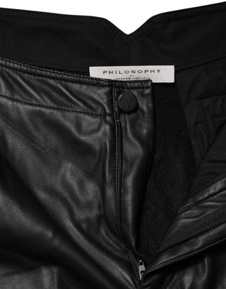 Pantalones cónicos negros con adornos