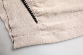 Suéter de polo con cuello de cachemira beige