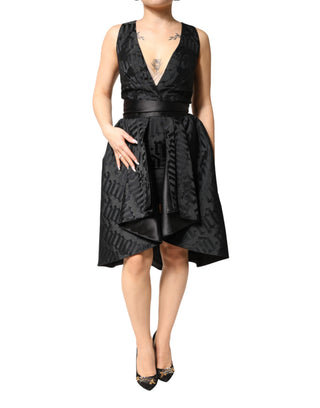 Schwarzes ärmelloses zweiteiliges Jacquard-Kleid mit tiefem V-Ausschnitt