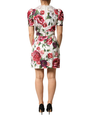 Vestido mini blanco con adornos florales y corte ajustado