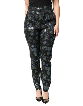 Pantalones ajustados metálicos con flores azul verdoso