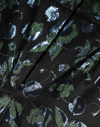 Pantalones ajustados metálicos con flores azul verdoso