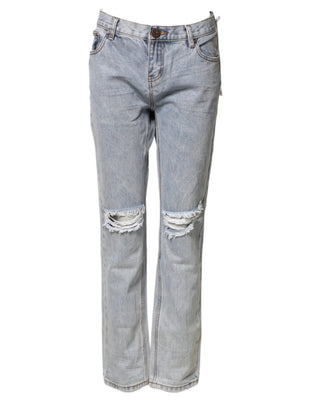 Jeans azul claro desgastados de cintura media y corte recto