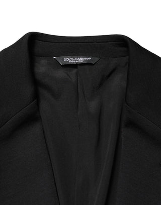 Blazer negro de lana con cierre de dos botones y un solo pecho
